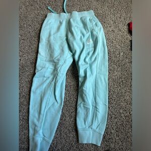 women’s blue/cyan nike sweats
